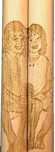 Image of two people engraved side by side from older photo that was taken. If the image is clear, we can engrave it