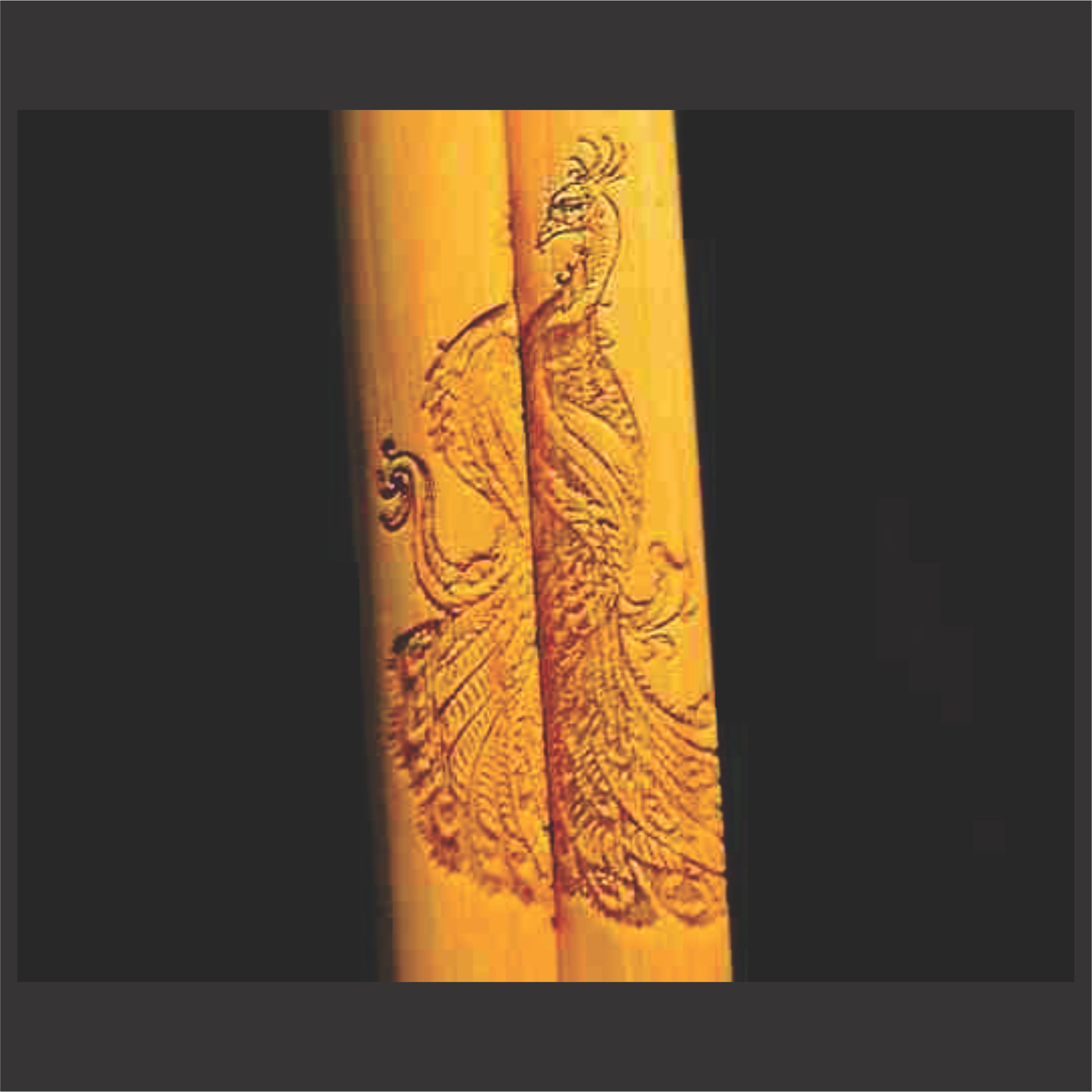 Detailed peacock graphic engraving on hickory drumsticks
