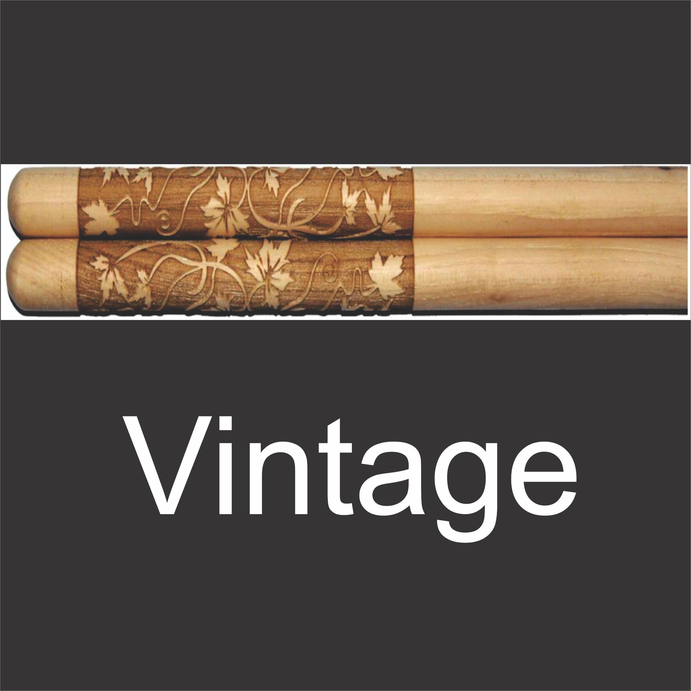 predesigned drumstick set with elaborate vine and leaf design