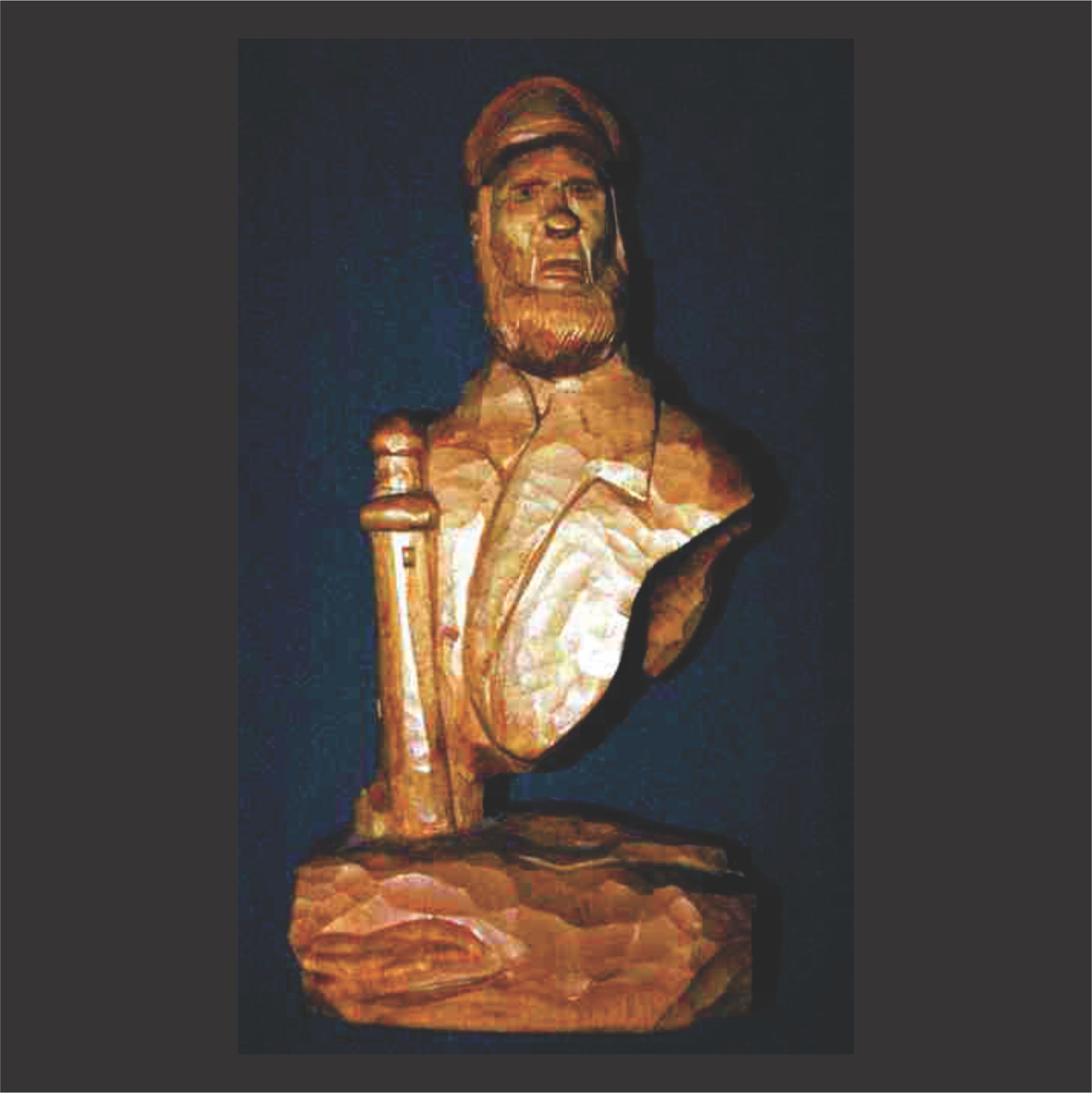 Sea captain and lighthouse wood carving by Ron Davidson